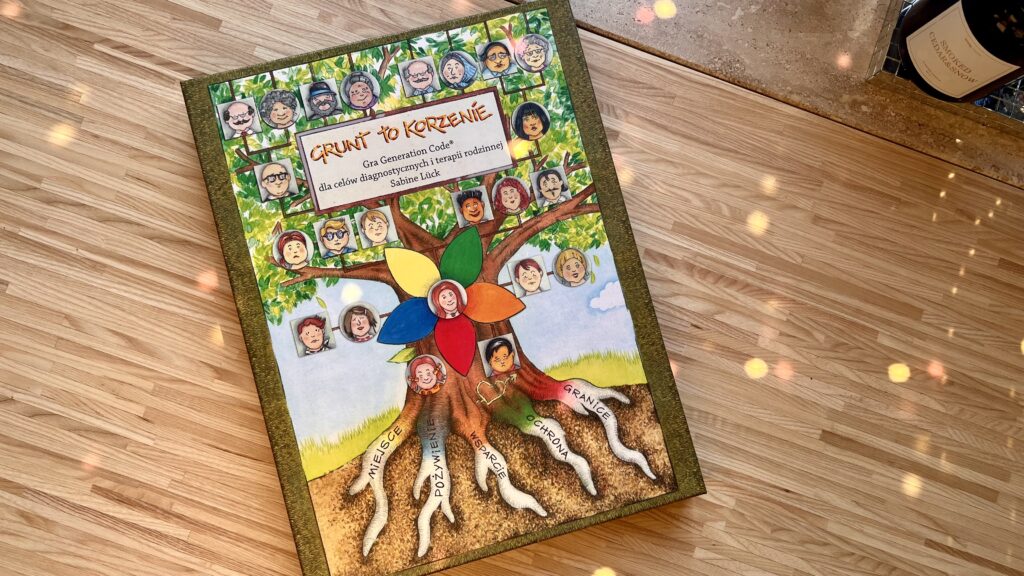 opakowanie gry "Grunt to korzenie" leżące na stole
